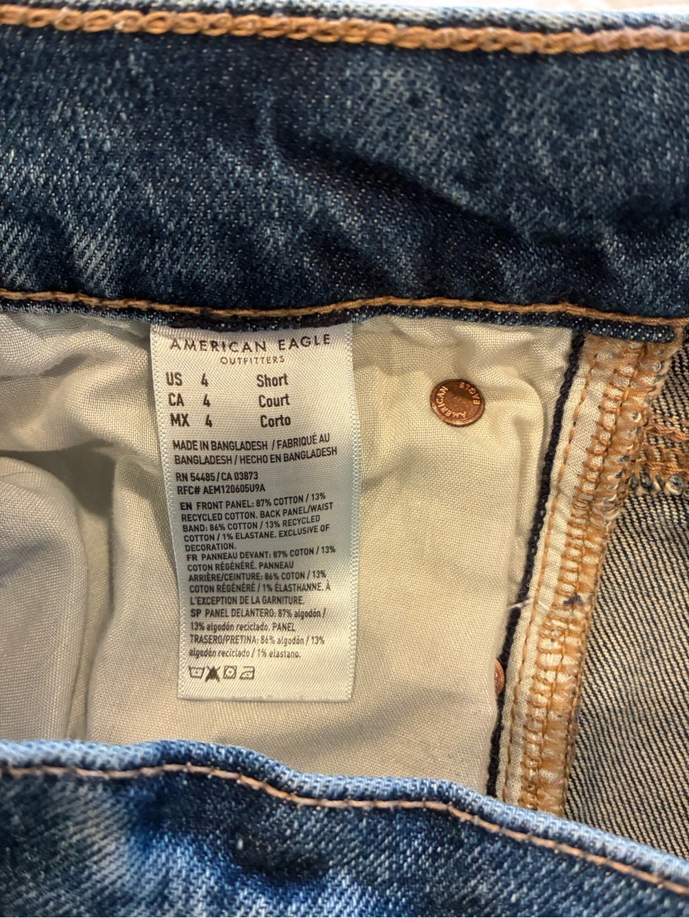 American Eagle Outfitters Medium Blue Denim Jeans with Tan Stitching